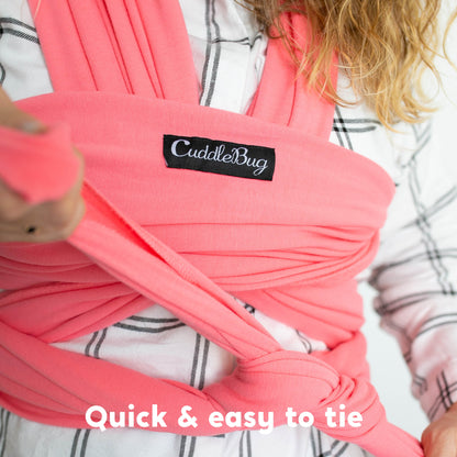 CuddleBug Original Baby Wrap – Pink. A soft, stretchy cotton-spandex baby wrap for newborns to toddlers (7-35 lbs). Provides hands-free comfort, even weight distribution, and a secure, snug fit for all body types.